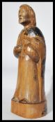 A 19th century Victorian carved olive wood religious figurine raised on plinth base. Measures 32