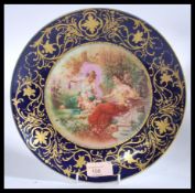 A Vienna circular cabinet plate, early 20th Century printed to centre with a classical study after