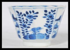 An 18th century Blue and White porcelain tea bowl / teabowl of scalloped form having hand painted