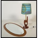 A vintage retro 20th century table lamp raised on circular base with central brass column along with