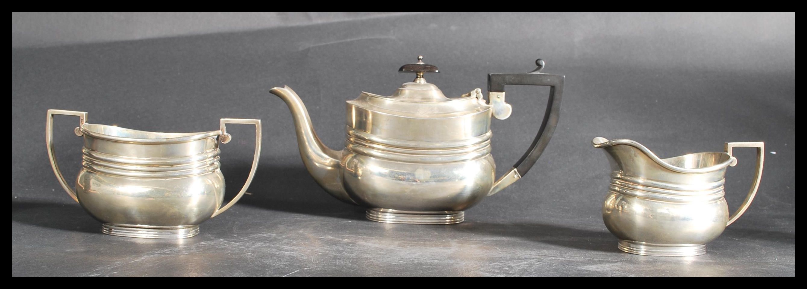 A silver hallmarked three piece tea service by For