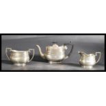 A silver hallmarked three piece tea service by For