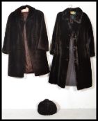 Two vintage 20th Century simulated ladies full length fur coats together with a mink tail hat and