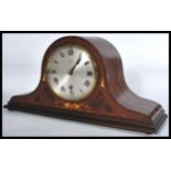 An early 20th Century Edwardian Hamburg America Company HAC inlaid mantle clock set within a