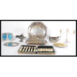 A collection of silver plate to include trays , cased set of cutlery , tureen , three sconce