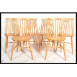 A set of six of vintage / retro Windsor spindle back elm and beech dining chairs in the manner of