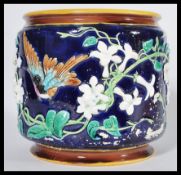 A 19th century Victorian planter / jardinière / vase in the manner of George Jones having relief