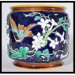 A 19th century Victorian planter / jardinière / vase in the manner of George Jones having relief