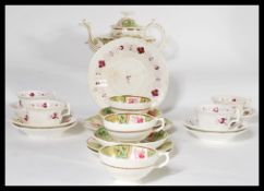 Two 19th century part tea services sets one complete with teapot having green and gilt detailing