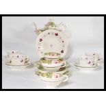 Two 19th century part tea services sets one complete with teapot having green and gilt detailing