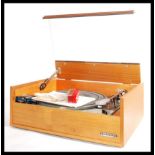 A vintage Goldring Leno GL75 record player, finishing in oreginal teak 'Dynatron'case / cabinet.