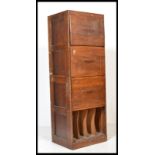 An early 20th century Industrial oak upright pedestal filing cabinet. The upright body with 3 filing