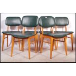 A set of 14 retro dinette utility style dining chairs / cafe chairs each with green padded seats and