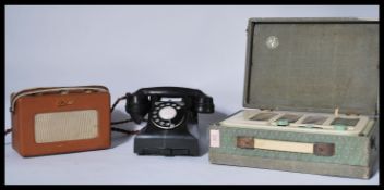 A vintage 20th Century cased Vidor radio, Roberts Radio together with a vintage bakelite telephone