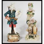 Two 19th century Victorian ceramic figurines to include a Ernst Bohne & Sohne pair of owls on