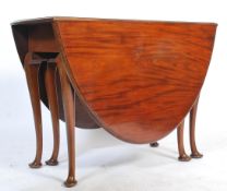An exceptional  19th century Georgian solid  mahogany drop leaf dining table being raised on