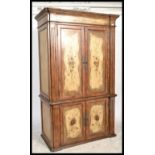 A 20th century painted house keepers cupboard wardrobe of Austrian / Bavarian origin. Twin door