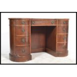 A Georgian revival mahogany kidney / lozenge shaped twin pedestal desk. Each cylinder end with a