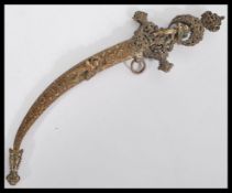 A 19th century Spamsih small decorative letter opener paper knife and scabbard. Decorated with