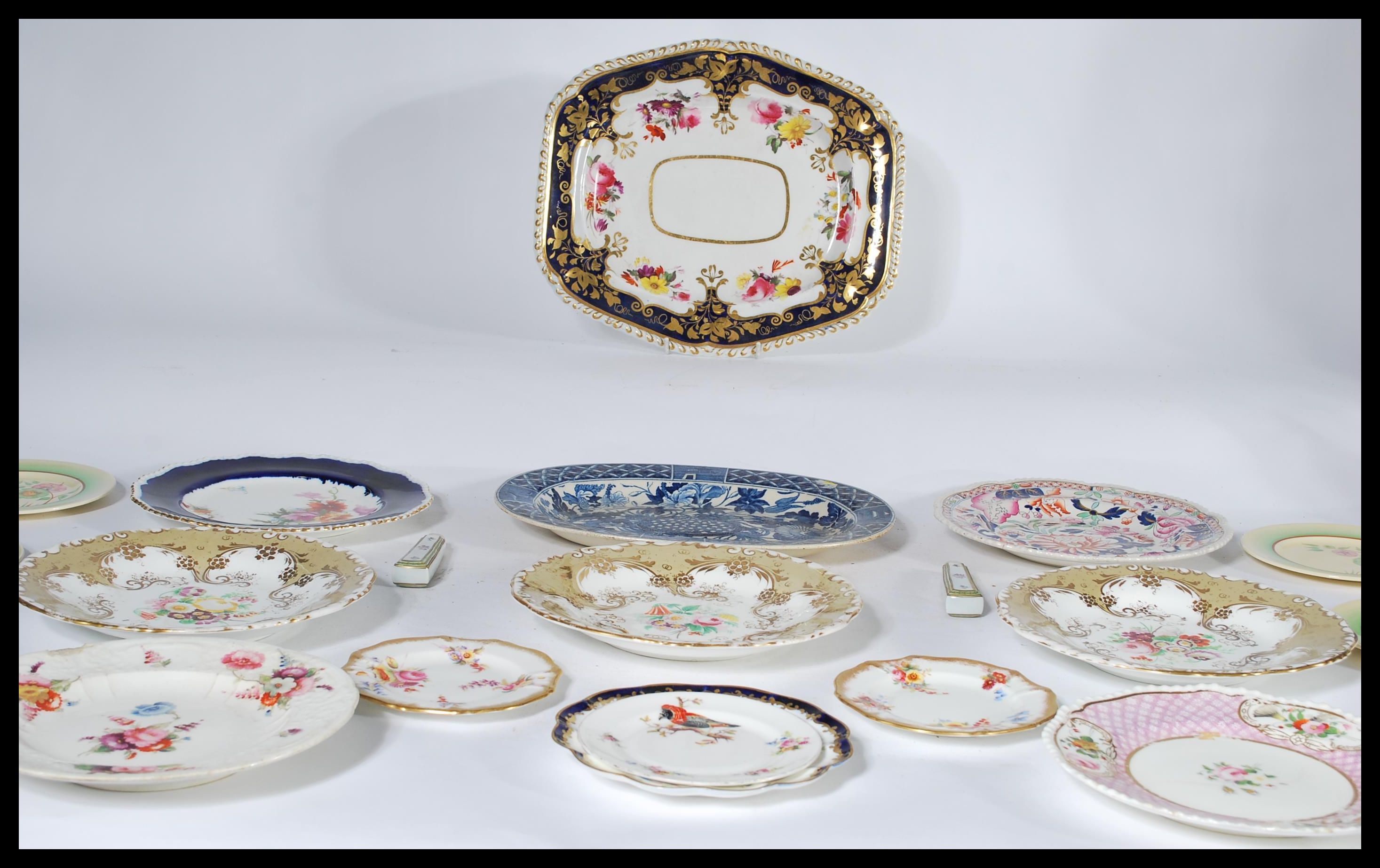 A collection of English cabinet plates dating from the early 19th century to include a Cnton China