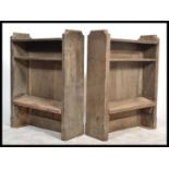 A pair of 19th century Victorian Gothic ecclesiastical form bookcases having open fronts with