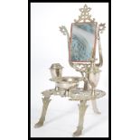 An apprentice piece silver plated dressing table in the Louis XVI style raised on cabriole legs with