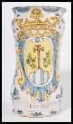 A believed 18th century French / Italian faience majolica polychrome vase dated 1780 with central