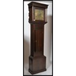 A 19th century longcase clock having oak trunk and