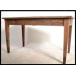 A country oak rustic 19th century, possibly French writing table desk. Of simple form raised on