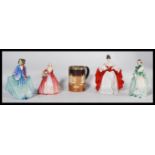 A collection of Royal Doulton ceramic figurines to include Sween Anne HN1318, Janet HN1537, Sara