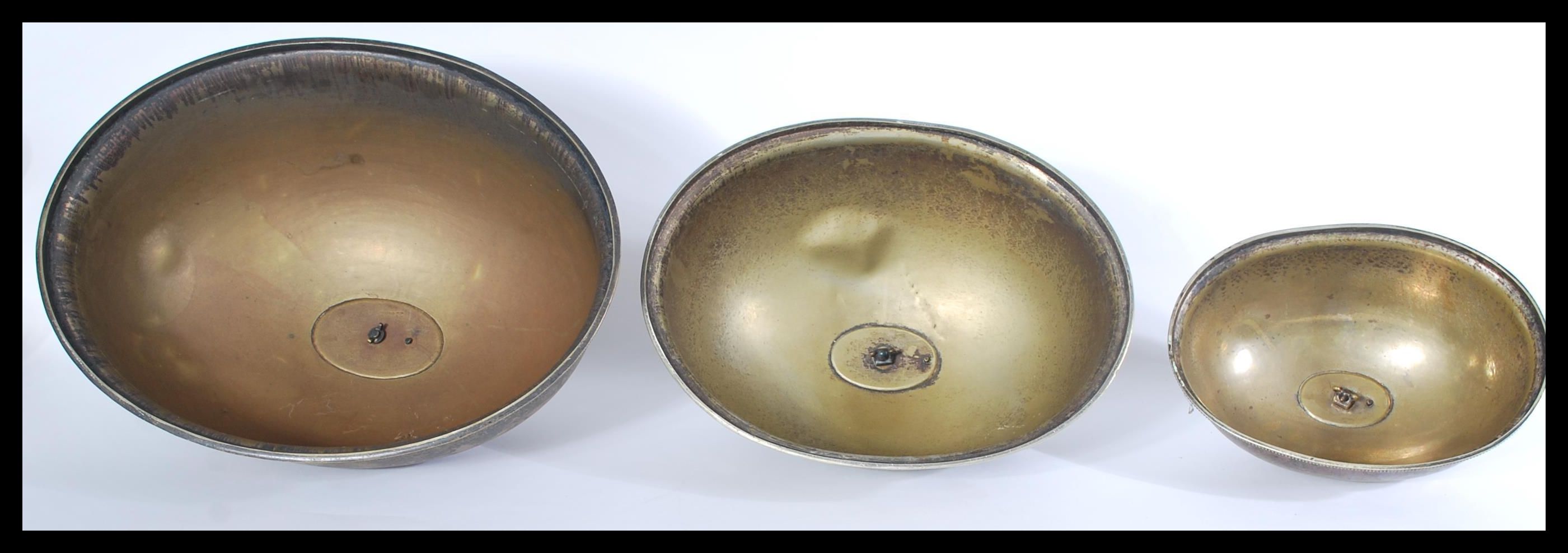 A set of 3 early 20th century silver plated meat covers. Each with banded edges of graduating size - Image 3 of 5
