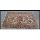 An early 20th century hand woven floor carpet rug on a Caucasian Soumak rug profusely decorated with