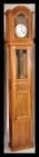 A 19th century French fruitwood longcase / comptoi