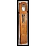 A 19th century French fruitwood longcase / comptoi