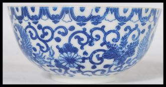 A 19th century Chinese porcelain blue and white bowl hand painted with scrolls and Ho Ho birds.