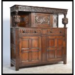 A 19th century VIctorian carved oak Jacobean reviv