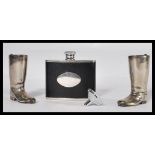 A pair of vintage mid Century silver plated drinking measures modelled as a pair of horse riding