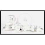 A 20th century Wedgwood Glen Mist Susie Cooper pattern tea service comprising cups, saucers,