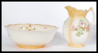 A late 19th Century Staffordshire transfer printed wash bowl and jug set, foliate decoration ob