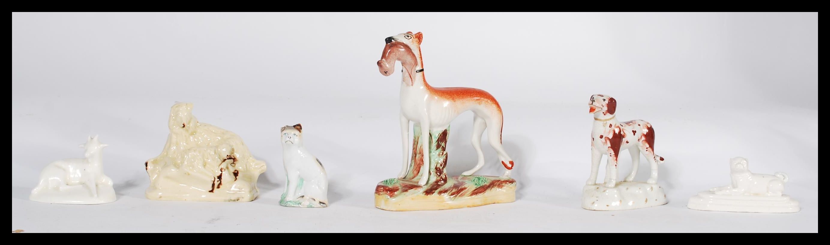 A group of Staffordshire ceramic figures of animals dating from the 18th century to include Canary