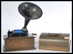 An Edison Gem phonograph:, with aluminium horn over black lacquer and gilt decorated body with