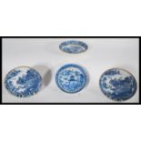 A group of four early English Factory most likely Worcester blue and white bowls / plates to include