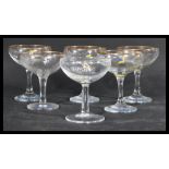 A group of six vintage Babycham glasses each featuring the iconic Babycham Faun. Highest measures 11