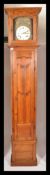 A 19th century French fruitwood longcase / comptoi