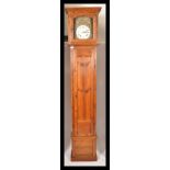 A 19th century French fruitwood longcase / comptoi