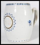 A late 18th century Chinese export porcelain small barrel shape mug tankard, with double,