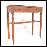 An early 20th Century oak marble topped washstand, single carved drawer to front raised on reeded