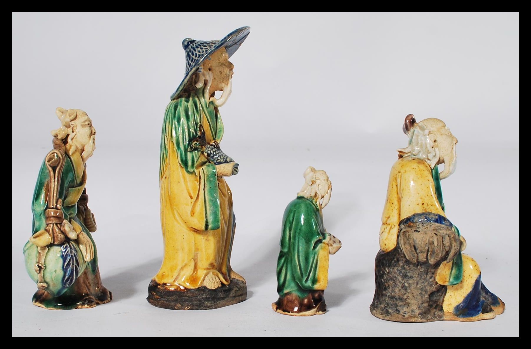 A group of four early 20th century Chinese pottery Mudman / Mudmen each in varying poses. Highest - Image 4 of 6