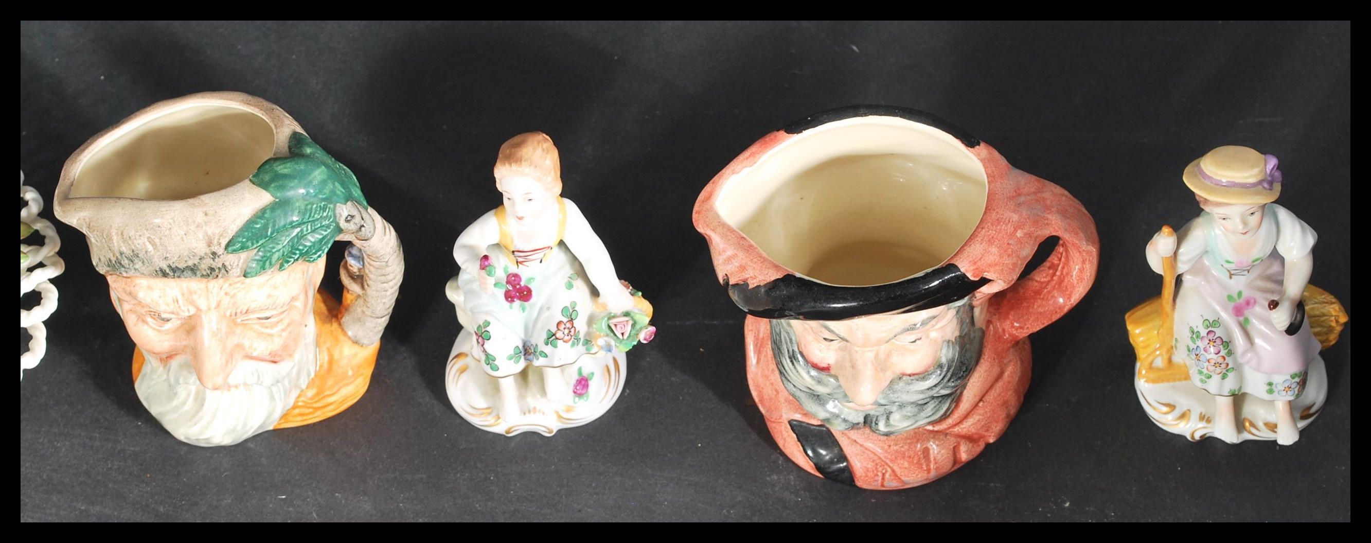 A group of four Sitzendorf ceramic figures along with three Royal Doulton Character jugs and a Crown - Image 5 of 10