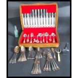 A mid 20th Century cased canteen of cutlery by Price Brothers together with a collection of loose